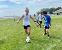 Boston College women's soccer player matches up against CHV staff member