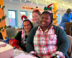 Three members of the CHV team volunteer at 2022 Holiday Assistance